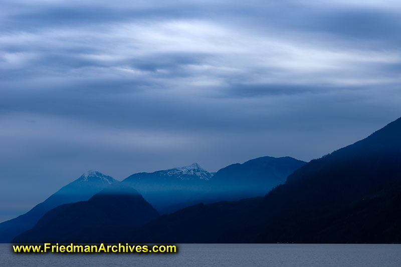 nature,dusk,dawn,blue,mountains,clouds,smoke,water,horizon,boating,canoeing,scenic,landscape,